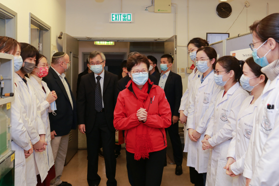 Mrs Lam says the government supports the sewage surveillance research which helps combat the Covid-19 outbreaks in HK. She gives Chinese New Year blessings to staff and students at the Lab.